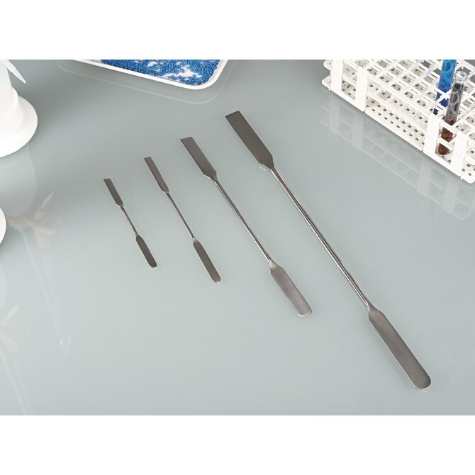 Double-sided spatula with an angular/rounded edge, made of stainless steel