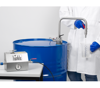 Dispensing system for solvents with discharge elbow